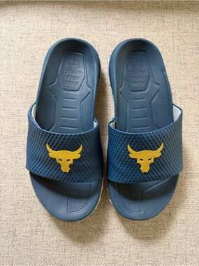 Under Armour Project Rock Fat Tire Slide Sandals with Yellow Brama Bull Logo